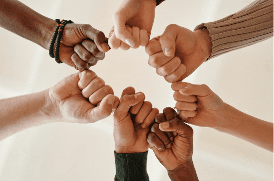 fists in a circle