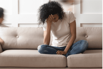 person sitting on couch