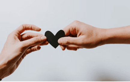 hands holding a heart