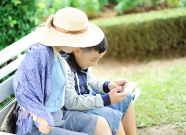two people on bench