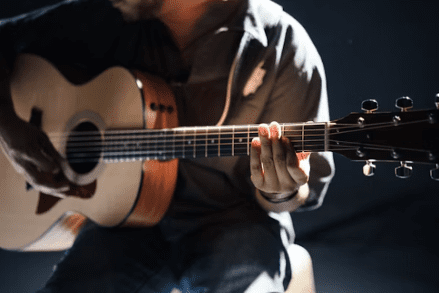 someone playing guitar