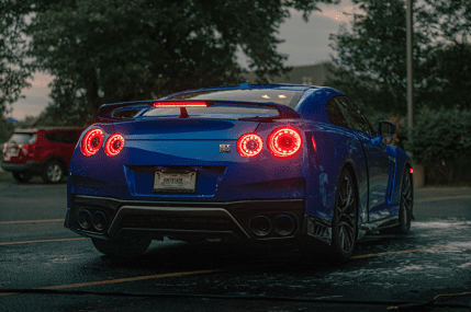 back of blue sedan