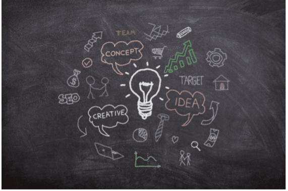 light bulb on blackboard with doodles